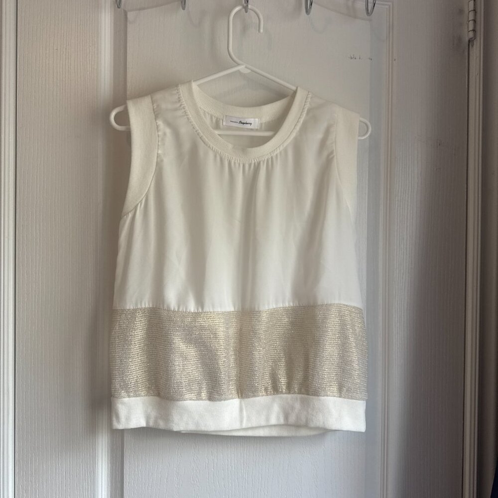 Sleeveless top with metallic band